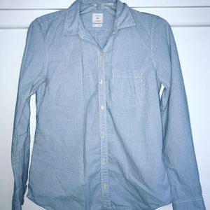 Pinstripe long sleeve button up shirt.
